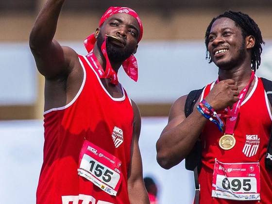 Two runners taking a selfie after finishing
